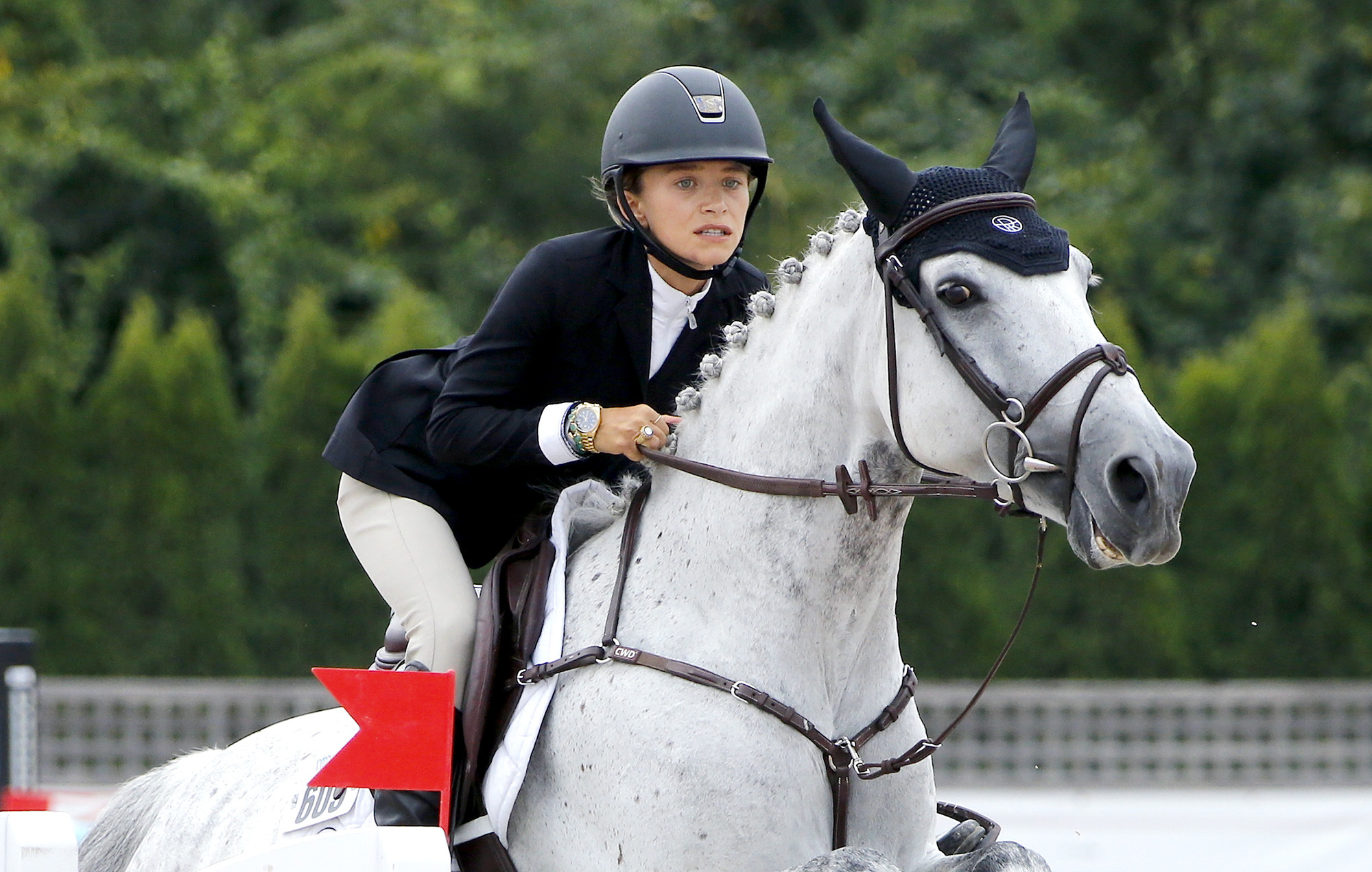 Photo of Mary-Kate Olsen Wears All Her Wedding Jewelry While Competing in Hamptons Horse Show